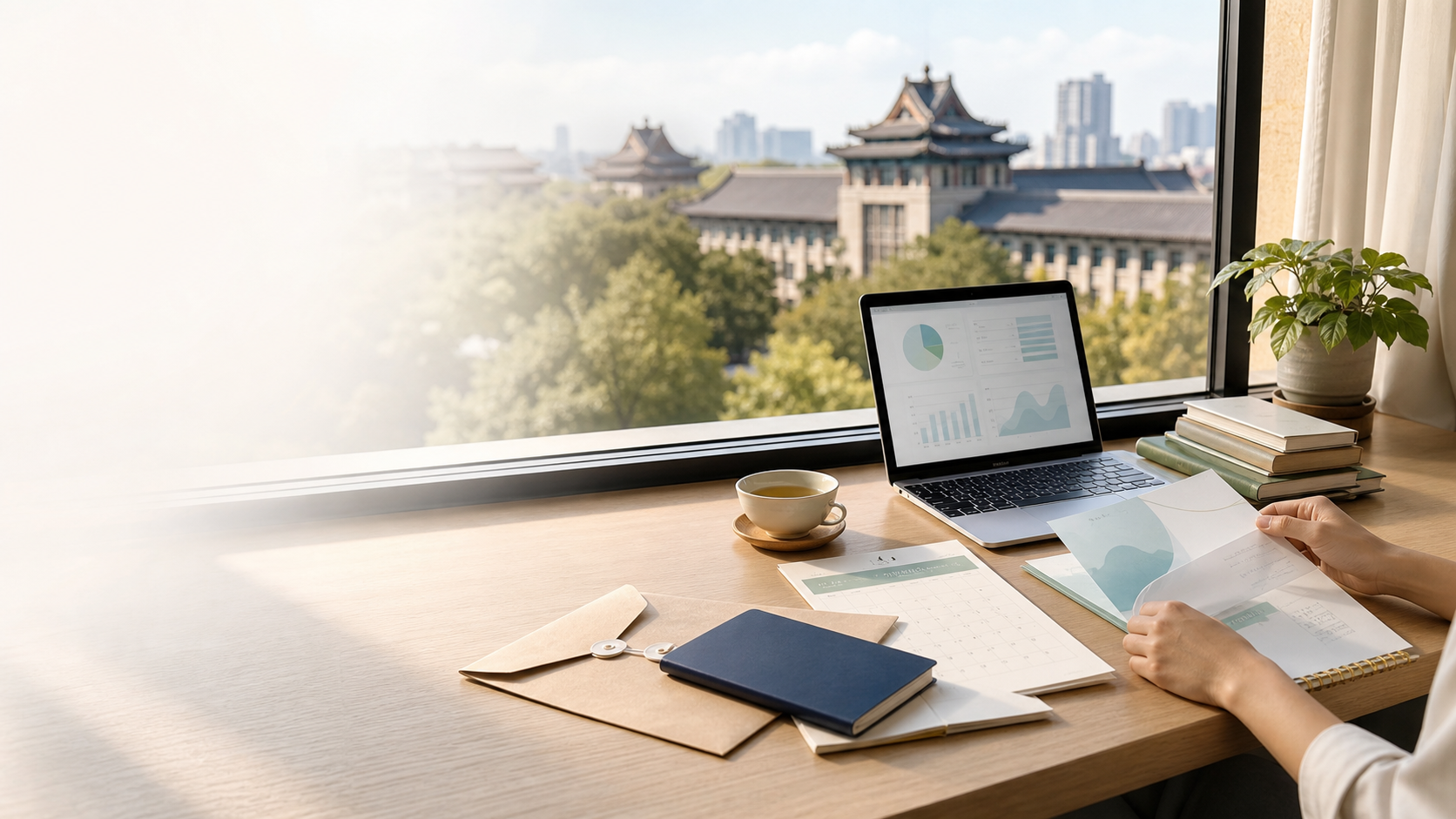 Application planning desk with study documents and a Chinese campus view